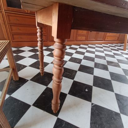 In the bookcase
Large rectangular table in...