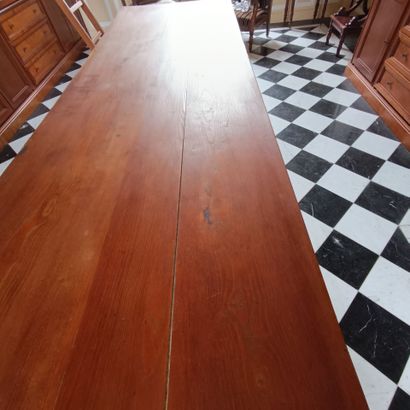 In the bookcase
Large rectangular table in...