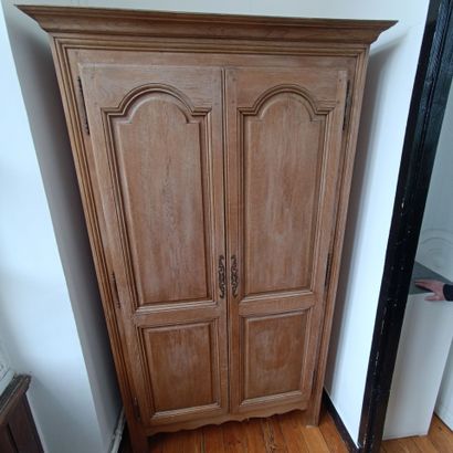 In the bathroom 
Natural wood molded cabinet.
Louis...