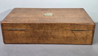 A large wooden household set, with a central...
