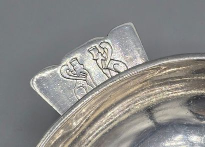 A silver-plated metal cup / display stand...