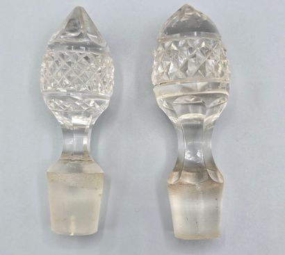 Pair of white crystal decanters with stoppers...