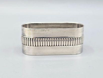 CHRISTOFLE
Silver-plated napkin ring encircled...