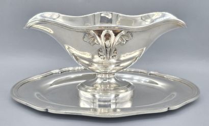 CHRISTOFLE
Saucière en métal argenté reposant...