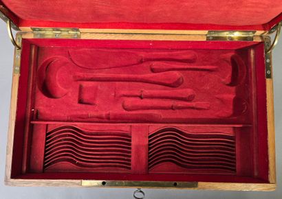 A large wooden household set, with a central...