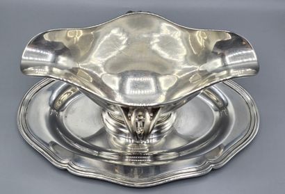 CHRISTOFLE
Saucière en métal argenté reposant...