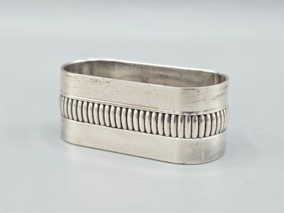 CHRISTOFLE
Silver-plated napkin ring encircled...