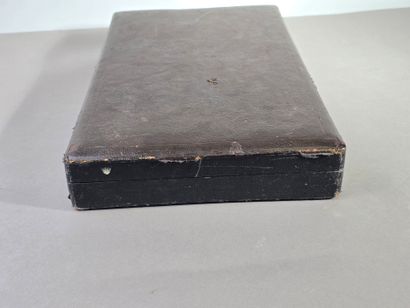 Household chest with leather-covered lid.

Interior...