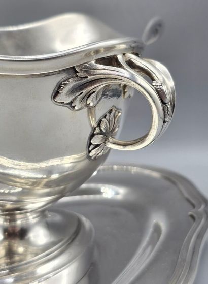 CHRISTOFLE
Saucière en métal argenté reposant...