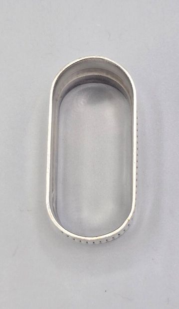 CHRISTOFLE
Silver-plated napkin ring encircled...
