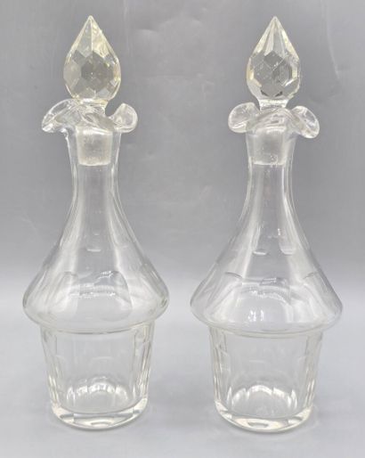Pair of white crystal decanters with their...