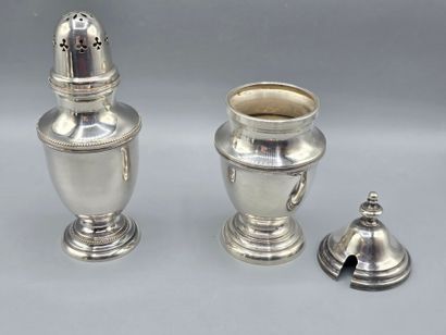 Set of silver-plated metal items including:
-...