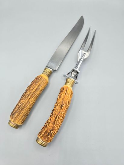 Carving set including meat knife and leg...
