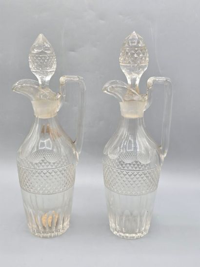 Pair of white crystal decanters with stoppers...