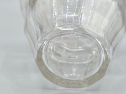 A white crystal decanter with its stopper...