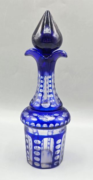 Blue crystal decanter with stopper.
H. 20.8...