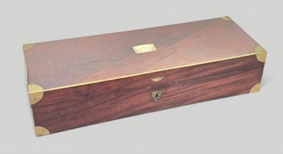 A mahogany household chest with brass fillets...