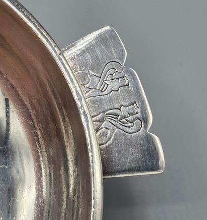 A silver-plated metal cup / display stand...