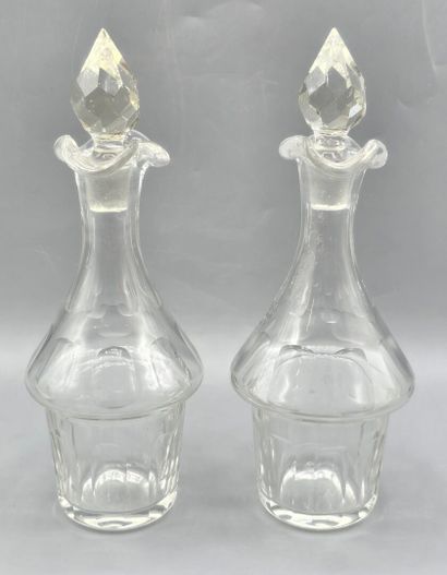Pair of white crystal decanters with their...
