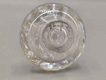 A white crystal decanter with its stopper...