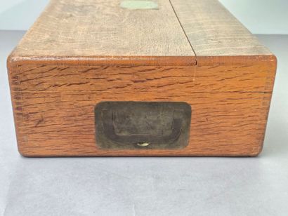 A large wooden household set, with a central...