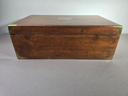 A large wooden household set with brass handles...