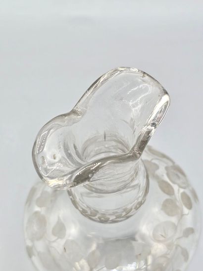 A white crystal decanter with its stopper...