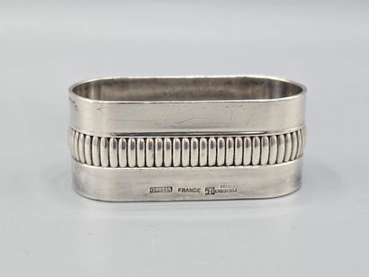 CHRISTOFLE
Silver-plated napkin ring encircled...