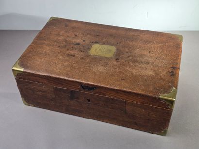 A large wooden household set with brass handles...