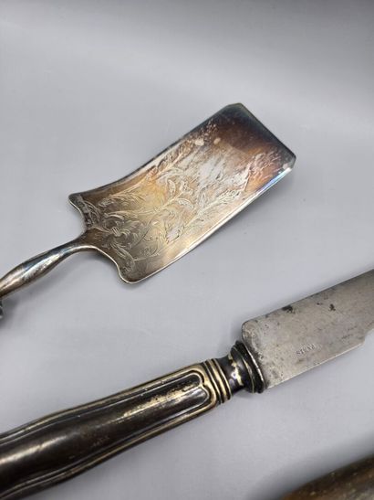 Meeting of silver-plated serving pieces including:...