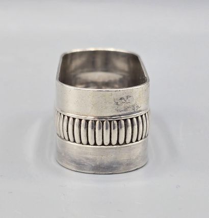 CHRISTOFLE
Silver-plated napkin ring encircled...