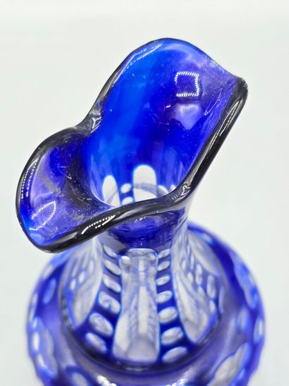 Blue crystal decanter with stopper.
H. 20.8...