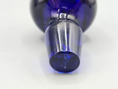 Blue crystal decanter with stopper.
H. 20.8...