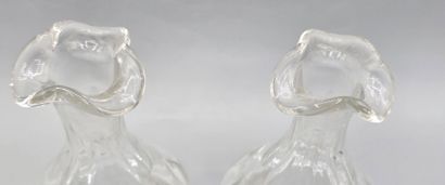 Pair of white crystal decanters with their...