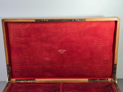 A large wooden household set, with a central...