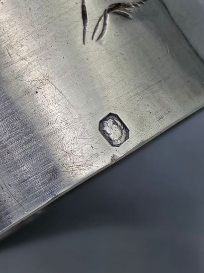 Rond de serviette en argent à décor ciselé...