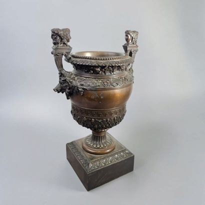 A significant antique-style bronze vase with...