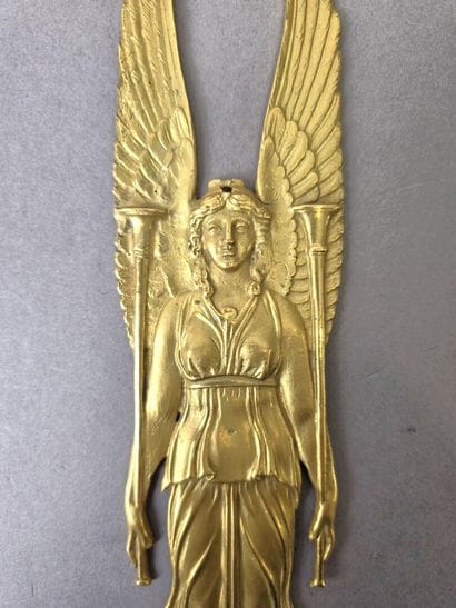 Pair of gilded, chiseled bronze wall sconces...
