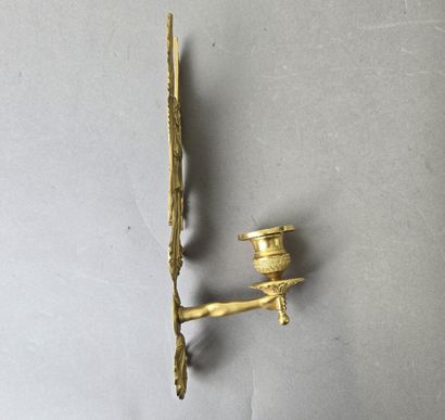 Pair of gilded, chiseled bronze wall sconces...