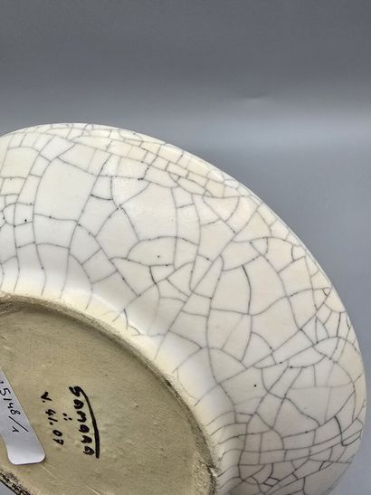 SAMARA
Ceramic vase with a flattened body...