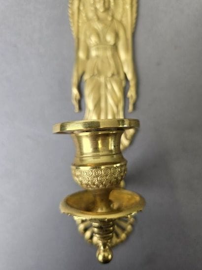 Pair of gilded, chiseled bronze wall sconces...