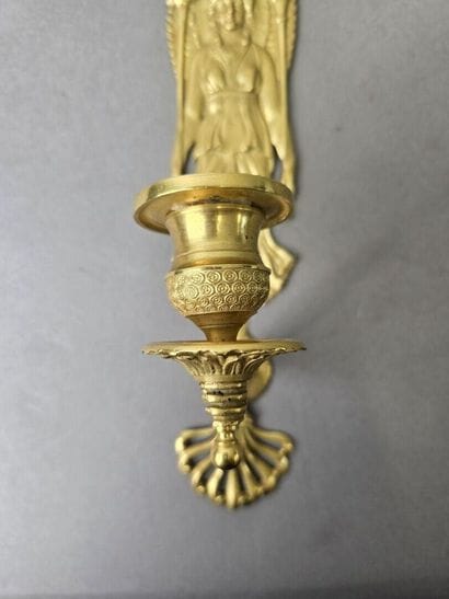 Pair of gilded, chiseled bronze wall sconces...