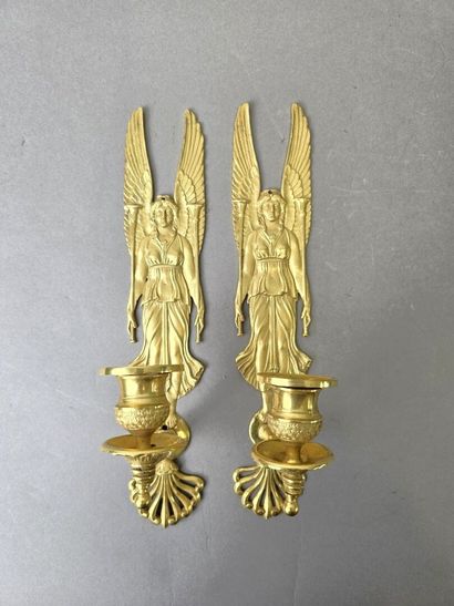 Pair of gilded, chiseled bronze wall sconces...