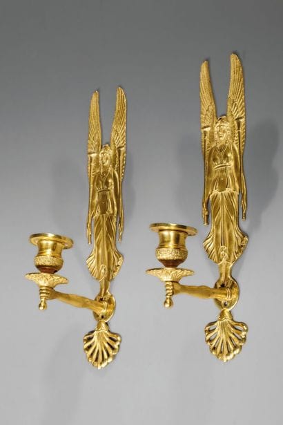 Pair of gilded, chiseled bronze wall sconces...