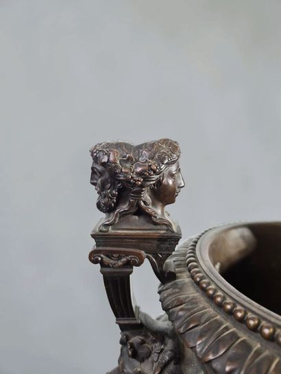 A significant antique-style bronze vase with...