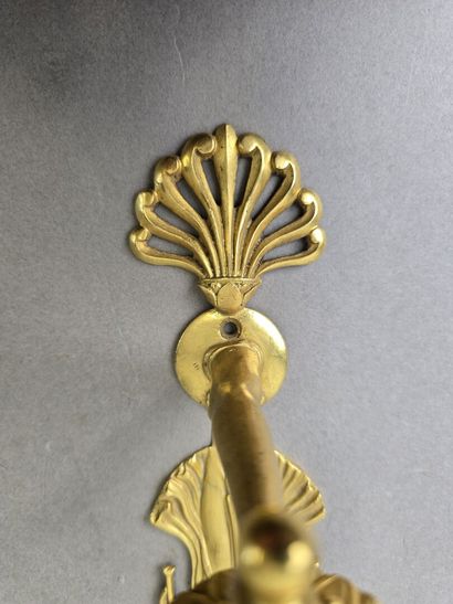 Pair of gilded, chiseled bronze wall sconces...