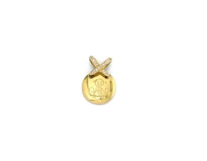 Round pendant in 18K (750/1000) yellow gold...