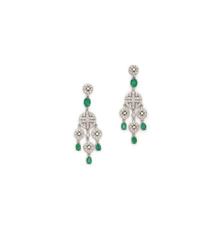 Pair of 18K (750/1000) white gold earrings...
