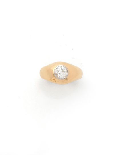 Bague jonc en or jaune 18K (750/1000) et...