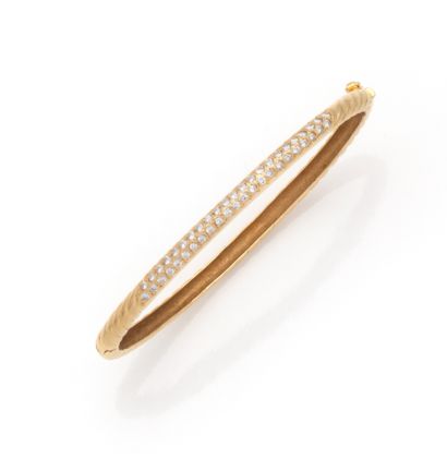 Bracelet jonc en or jaune 18K (750/1000)...